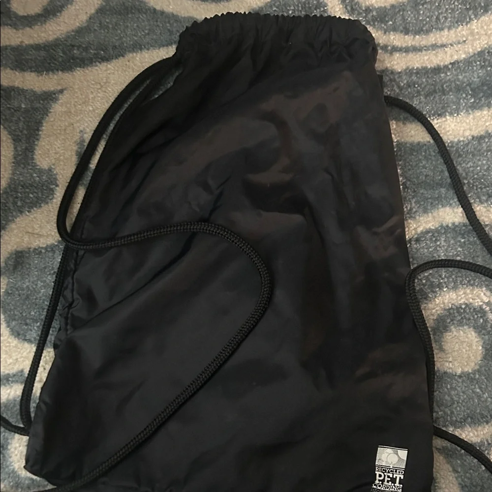 Nike Black Drawstring Backpack with White Swoosh